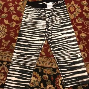 Nike cropped black and white stripped leggings.